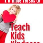 little girl holding a heart who wants to teach kids kindness